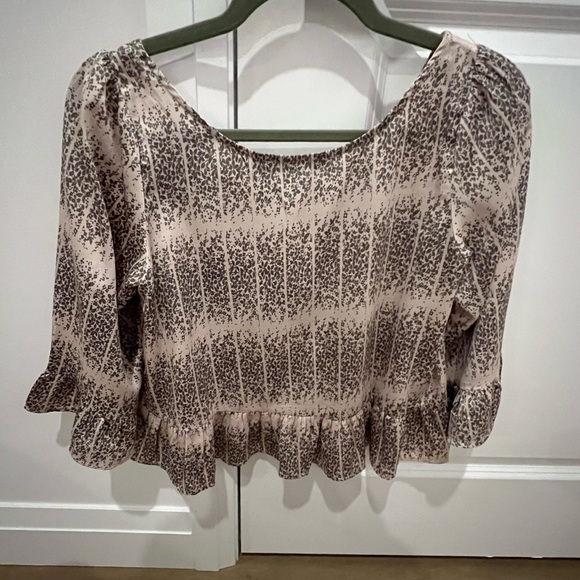 Cute cropped blouse with ruffle detail on sleeves and bottom. - Picture 3 of 3